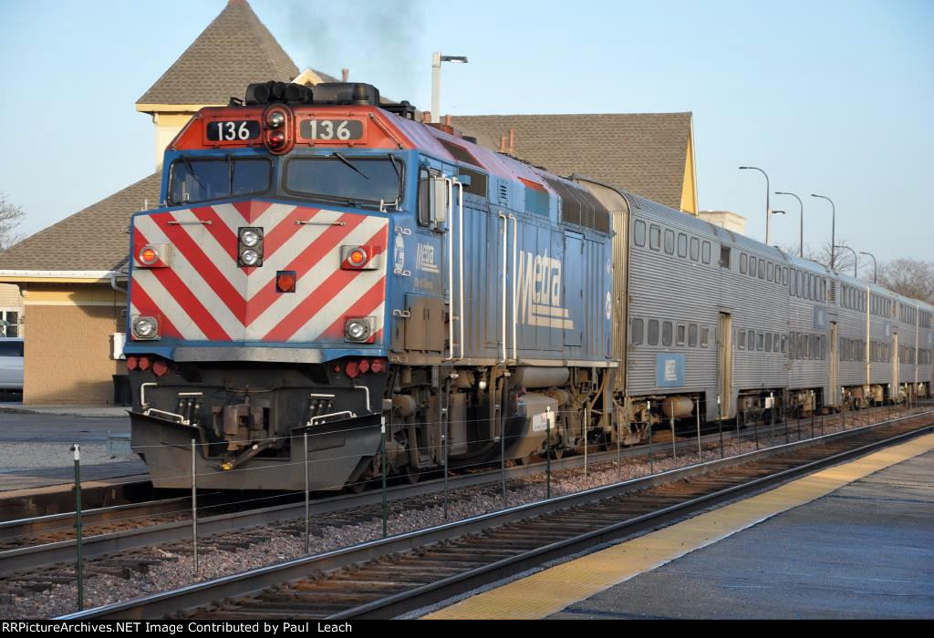 Commuter makes its station stop before shoving east